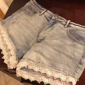 Free people distressed crochet shorts